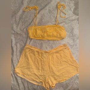 Dippin daisy’s tube top and high waisted ruffle shorts set.